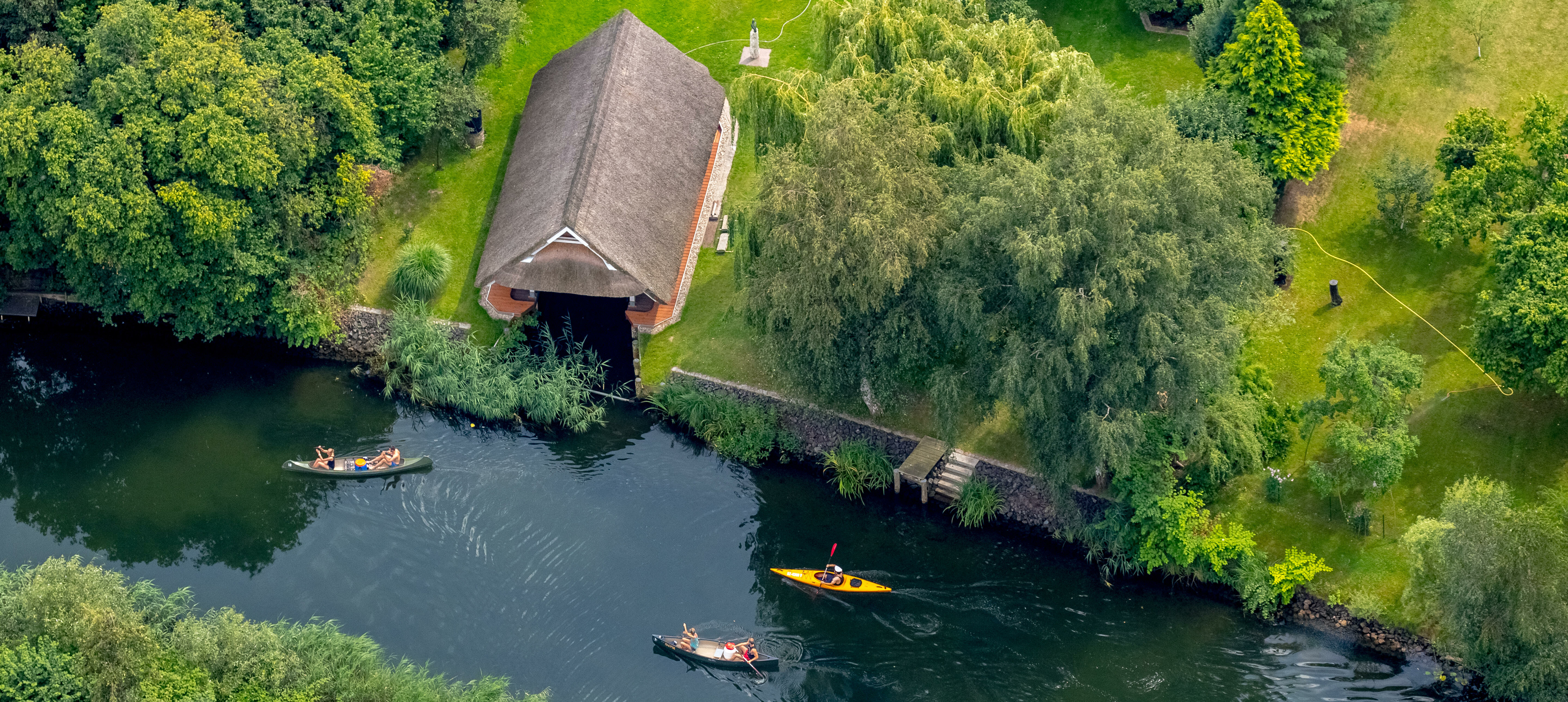 Kanufahrer auf der Elde in Plau am See